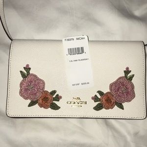 flrl embroidered fold over coach purse